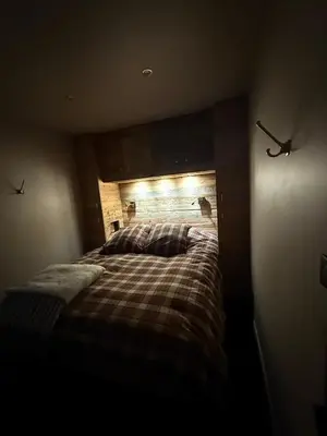 Un ou plusieurs lits dans un hébergement de l'établissement MyHome - L'Absinthe Bleue - Appartement 4-6 personnes neuf 4 étoiles - balcon sud- ski aux pieds - Tignes Val Claret