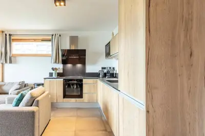 Cuisine ou kitchenette dans l'établissement Résidence L'ecrin - ECRIN B21 MAE-0101