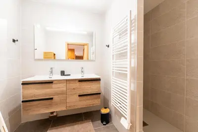 Salle de bains dans l'établissement Les Cristaux Blancs - Station de ski à pied