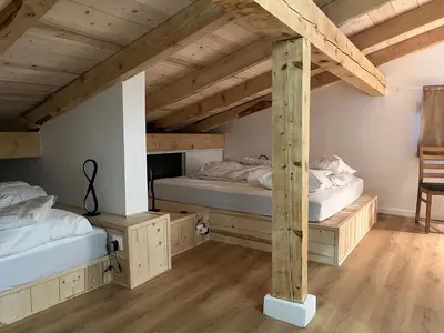 Un ou plusieurs lits dans un hébergement de l'établissement Duplex 6 pers Tignes le lac