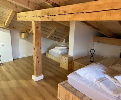Un ou plusieurs lits dans un hébergement de l'établissement Duplex 6 pers Tignes le lac