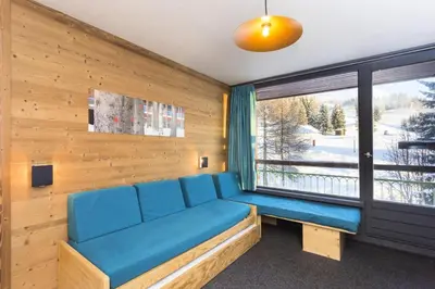 Coin salon dans l'établissement Résidence Lauzieres - Studio 5 personnes pied des pistes MAE-5134