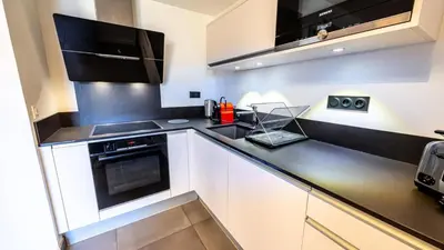 Cuisine ou kitchenette dans l'établissement Résidence L'ecrin - ECRIN A22 MAE-0131