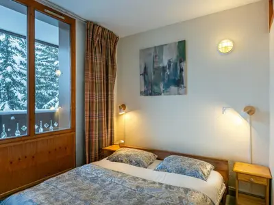 Un ou plusieurs lits dans un hébergement de l'établissement Appartement classique avec Wifi, 2 ch., Val-d'Isère - FR-1-694-374