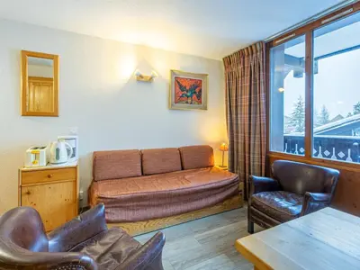 Coin salon dans l'établissement Appartement classique avec Wifi, 2 ch., Val-d'Isère - FR-1-694-374