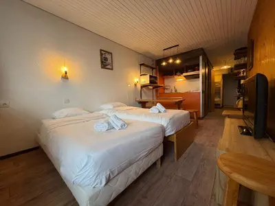 Un ou plusieurs lits dans un hébergement de l'établissement Studio centre Val d'Isere