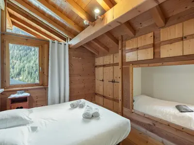 Un ou plusieurs lits dans un hébergement de l'établissement 3 Chalets Paradiski, les Arcs Peisey Vallandry - 10 personne x 3