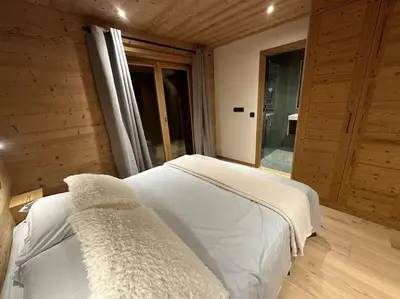 Un ou plusieurs lits dans un hébergement de l'établissement CHALET BELLECOTE 1500 - 12 personnes PEISEY NANCROIX - LES ARCS - LA PLAGNE - PARADISKI