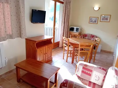 Télévision ou salle de divertissement dans l'établissement Terrasses D 501 PARC NAT VANOISE appart 5 pers