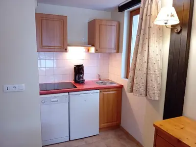 Cuisine ou kitchenette dans l'établissement Terrasses E 309 PARC NAT VANOISE appart 6 pers