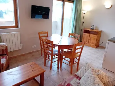 Télévision ou salle de divertissement dans l'établissement Terrasses D 302 PARC NAT VANOISE appart 4 pers
