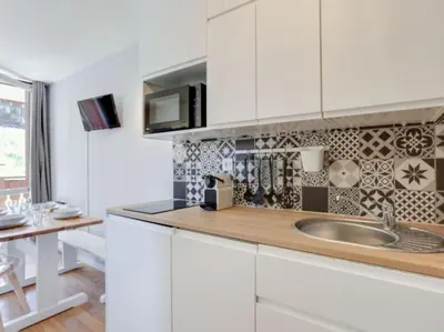 Cuisine ou kitchenette dans l'établissement RPP B142 -APPARTEMENT 4 PERS pieds des pistes