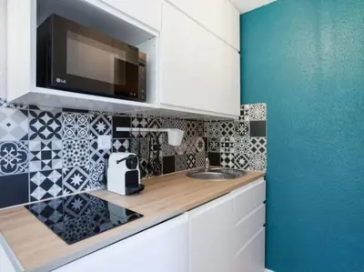 Cuisine ou kitchenette dans l'établissement RPP B142 -APPARTEMENT 4 PERS pieds des pistes