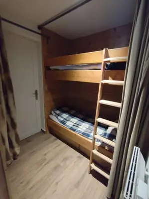 Un ou plusieurs lits dans un hébergement de l'établissement Appartement à Belle Plagne au pied des pistes
