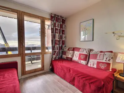 Un ou plusieurs lits dans un hébergement de l'établissement Studio cabine 4 pers au pied des pistes avec balcon - FR-1-455-262