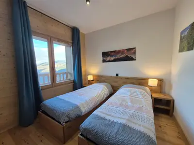 Un ou plusieurs lits dans un hébergement de l'établissement Fermes Eugénie A5 - Superbe appartement 3 pièces - St Foy Station