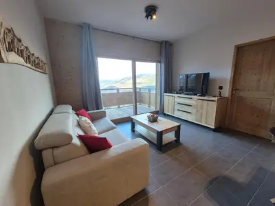 Télévision ou salle de divertissement dans l'établissement Fermes Eugénie A5 - Superbe appartement 3 pièces - St Foy Station