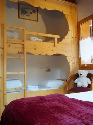 Un ou plusieurs lits dans un hébergement de l'établissement Chalet Les Barmés