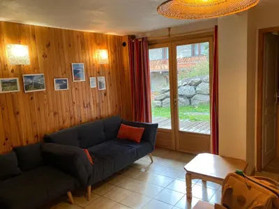 Coin salon dans l'établissement La Mourra Appartement 5 personnes