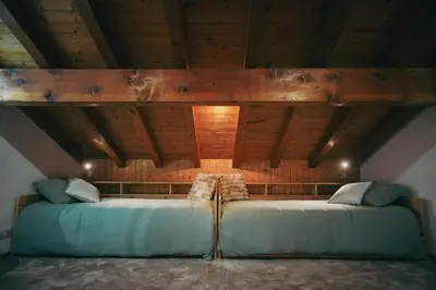 Un ou plusieurs lits dans un hébergement de l'établissement Auberge La Table D'