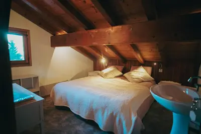 Un ou plusieurs lits dans un hébergement de l'établissement Auberge La Table D'