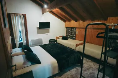 Un ou plusieurs lits dans un hébergement de l'établissement Auberge La Table D'