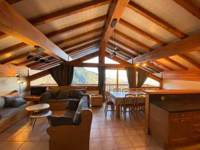 Coin salon dans l'établissement Chalet Marmotton-Domaine des Arcs