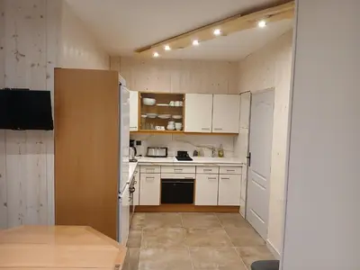 Cuisine ou kitchenette dans l'établissement chez Léon