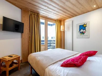Un ou plusieurs lits dans un hébergement de l'établissement Apartment Les Hauts du Val Claret - Val Claret-27 by Interhome