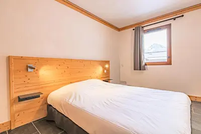 Un ou plusieurs lits dans un hébergement de l'établissement Résidence Le Criterium - Résidence Le Critérium 3Chalet E Appartement 4 MAE-7721