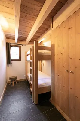 Un ou plusieurs lits dans un hébergement de l'établissement Résidence Le Criterium - Résidence Le Critérium 3Chalet E Appartement 8 MAE-7751
