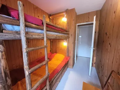 Un ou plusieurs lits superposés dans un hébergement de l'établissement Résidence Trolle-soldanelle - Appartement 4 personnes fonctionnel MAE-7811