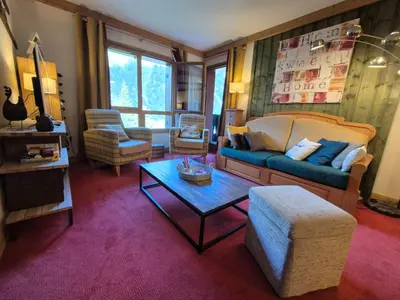 Coin salon dans l'établissement Arc 1950 - Appartement 2 chambres - 6 personnes - 53m2-ski aux pieds - Les Sources de Marie
