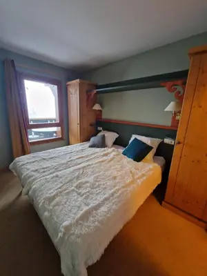 Un ou plusieurs lits dans un hébergement de l'établissement Arc 1950 - Appartement 2 chambres - 6 personnes - 53m2-ski aux pieds - Les Sources de Marie