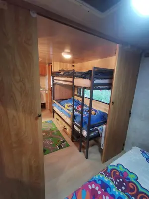 Un ou plusieurs lits dans un hébergement de l'établissement Caravane 4 personnes au camping d'Aussois