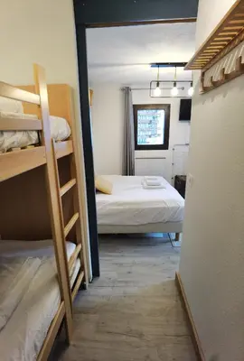 Un ou plusieurs lits dans un hébergement de l'établissement MyHome - PSO37 - Studio cosy 4 pax Val Claret