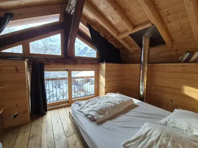 Un ou plusieurs lits dans un hébergement de l'établissement La Masure Magnifique chalet - proche domaine St Foy