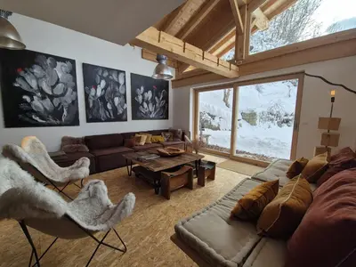 Coin salon dans l'établissement La Masure Magnifique chalet - proche domaine St Foy