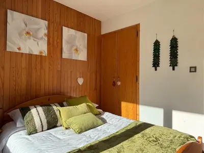 Un ou plusieurs lits dans un hébergement de l'établissement Appartement Chez Jean - 2 chambres - Centre du Village - À 30 mètres des télécabines