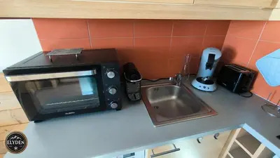 Cuisine ou kitchenette dans l'établissement Appartement Les Gémeaux - La Plagne - Belle Plagne