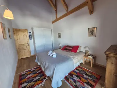 Un ou plusieurs lits dans un hébergement de l'établissement Chalet Cent Names - 8 pers - St Foy Station