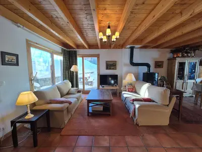 Coin salon dans l'établissement Chalet Cent Names - 8 pers - St Foy Station