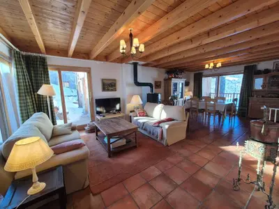 Coin salon dans l'établissement Chalet Cent Names - 8 pers - St Foy Station