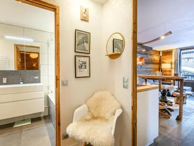 Coin salon dans l'établissement Charmant appartement cosy au cœur de Val-d'Isère - FR-1-694-377