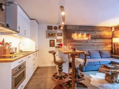 Cuisine ou kitchenette dans l'établissement Charmant appartement cosy au cœur de Val-d'Isère - FR-1-694-377