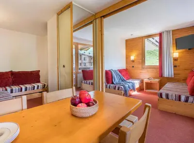 Coin salon dans l'établissement Les Terrasses Blanches - Appartement Belle Plagne - 4 personnes - Exposition plein Sud - Sur pistes