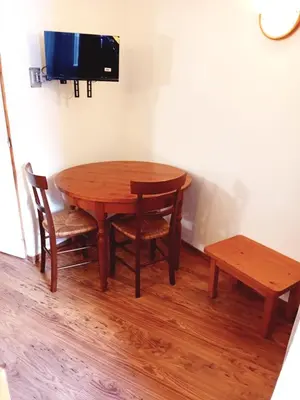 Télévision ou salle de divertissement dans l'établissement Terrasses D 103 - PARC NAT VANOISE studio 2 pers