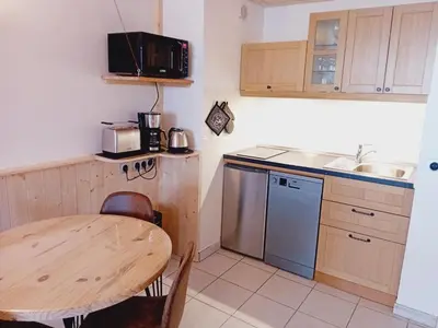 Cuisine ou kitchenette dans l'établissement Terrasses F 002 - PARC NAT VANOISE appart 4 pers