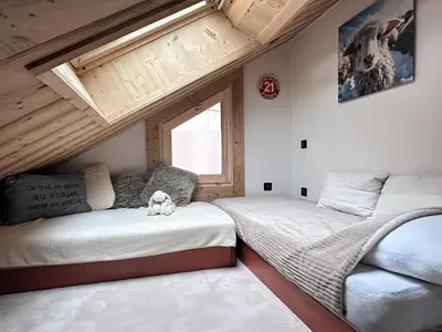 Un ou plusieurs lits dans un hébergement de l'établissement L’Éterlou Au pied des pistes, vue montagne