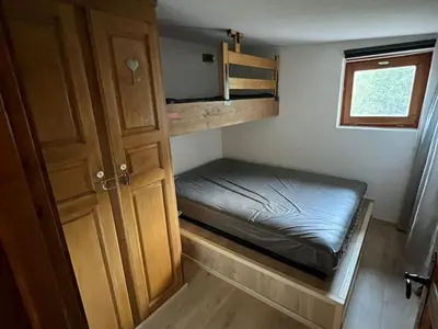 Un ou plusieurs lits dans un hébergement de l'établissement Duplex skis aux pieds pour 6 à Arc 1800 avec balcon - FR-1-411-951